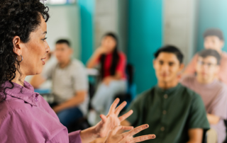 a teacher in front of a class